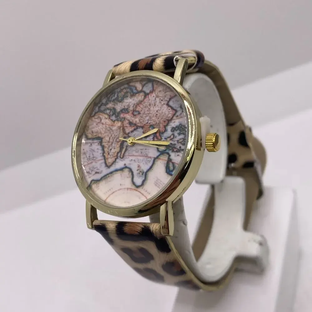 Womens Gold Tone Cheetah World Map Watch New Battery